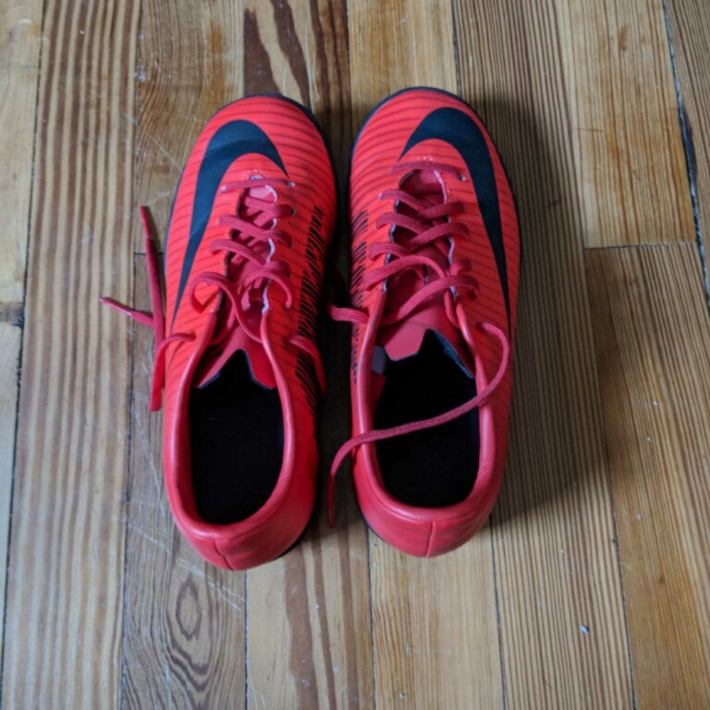 Red Nike hypervenomx turf shoe